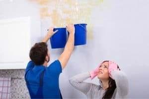 catching water leak from ceiling in buckets