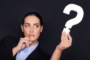 person holding question mark