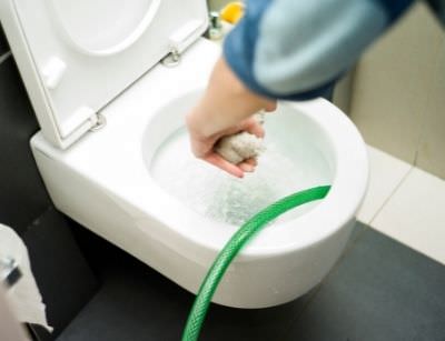 cleaning toilet